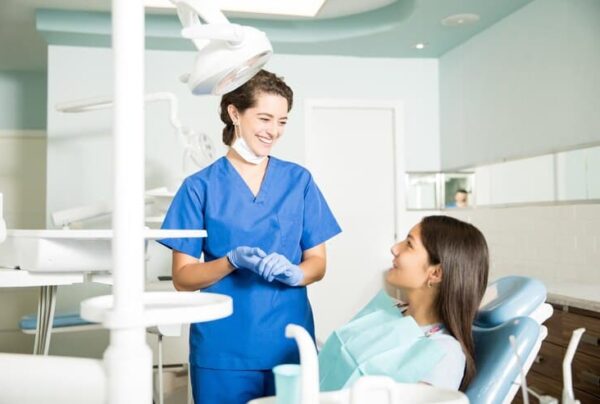 Dentist in Sutton treating patient